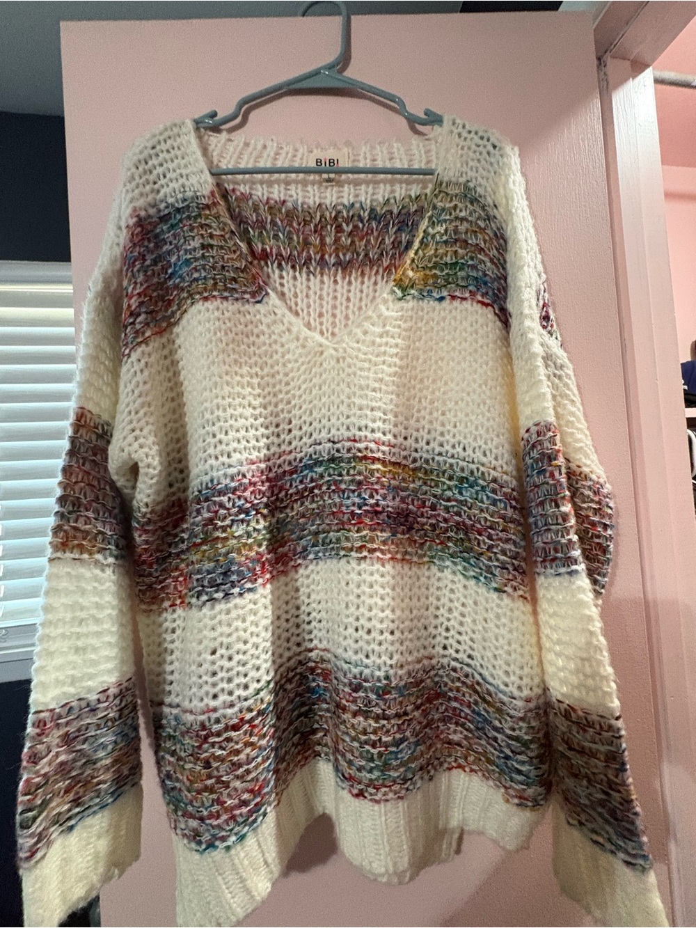 BiBi Cream V-Neck Sweater with Multicolor Stripe Accents